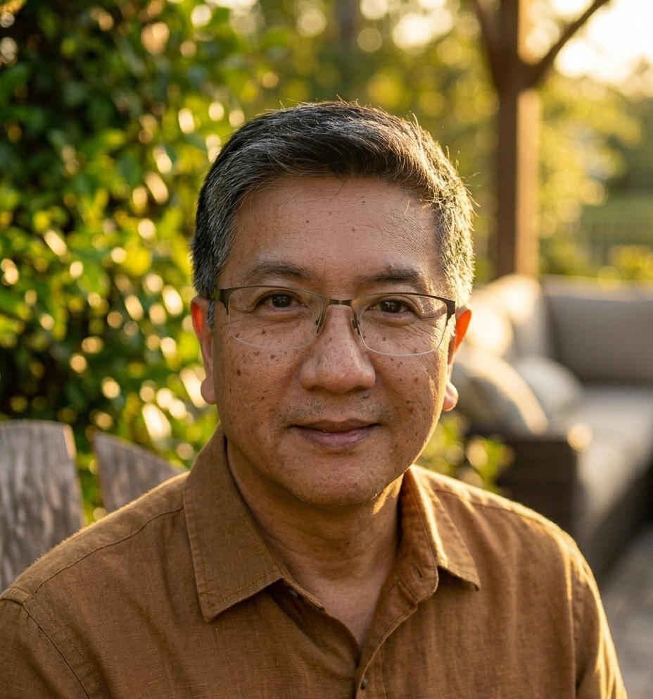 Donn Durante - Author, Speaker, and Career Resilience Expert Donn Durante, memoir author and career resilience expert, professional headshot in light blue shirt